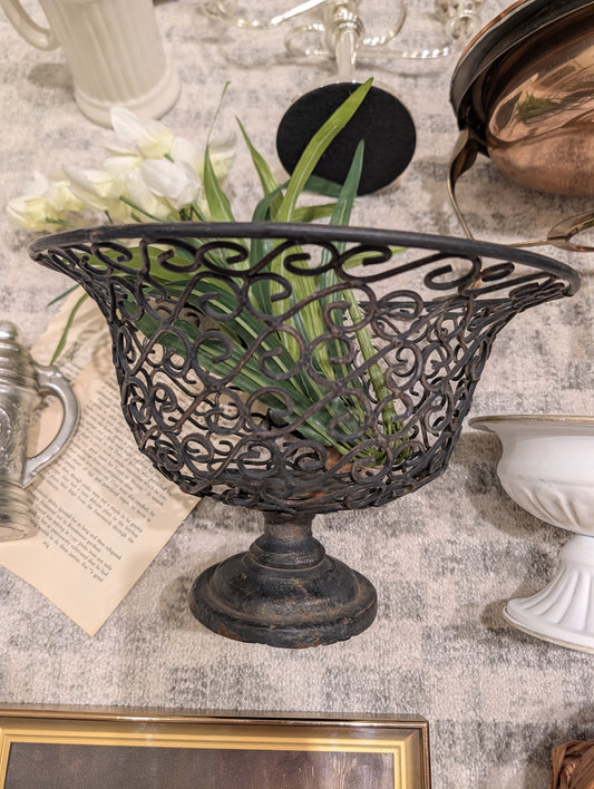 Black wrought iron pedestal fruit bowl