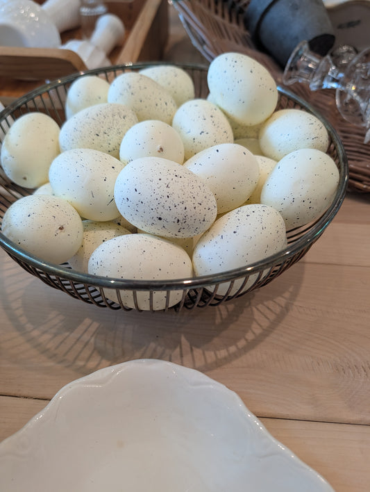 Speckled Eggs in wire basket