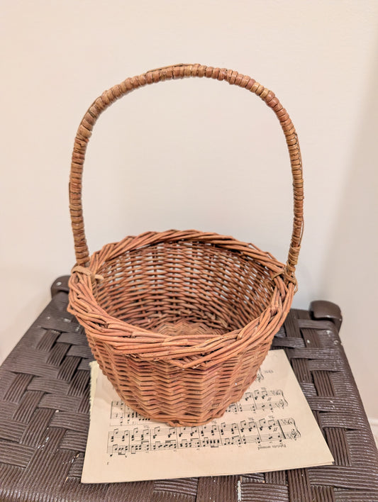 Vintage-style woven willow gathering basket
